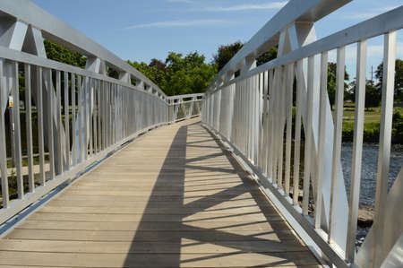 A closeup of a walking bridge during the sunlight to showcase all the lines of interest.の写真素材
