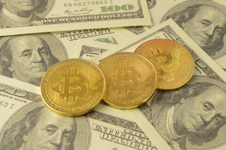 The future of money is said to be held in cryptocurrency while the past is in fiat cash money.の写真素材