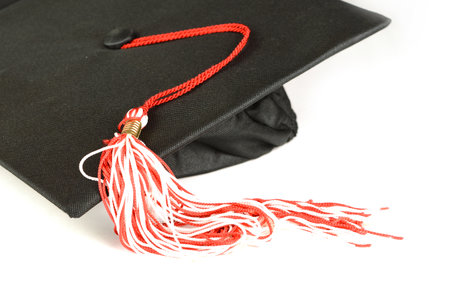 A closeup of a grad hat over a white background.の写真素材