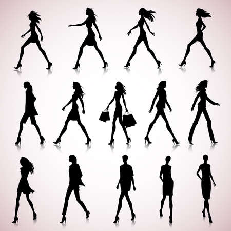Set of walking female silhouettes in fashion clothesのイラスト素材