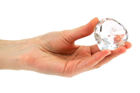 Women's hand holds crystal with declaration of love isolatedの写真素材