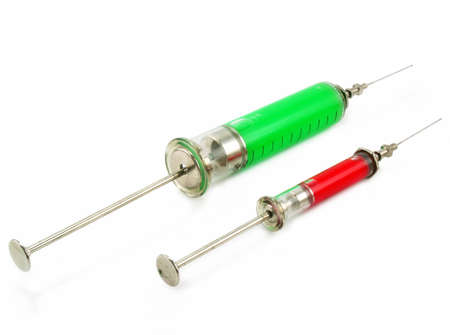 Two syringes with acid substance isolated on a white backgroundの写真素材