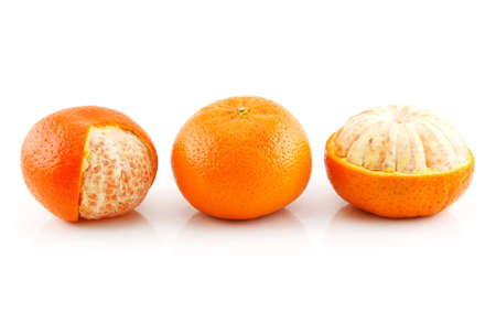 Three Ripe Tangerine Fruits Isolated on White Background の写真素材