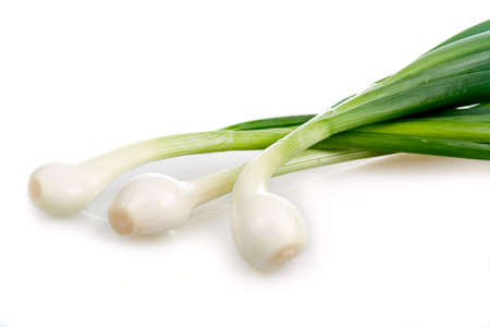 Bunch of green onion vegetables isolated on white backgroundの写真素材