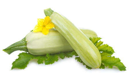 ripe marrow vegetable with leaf isolated on a white backgroundの写真素材