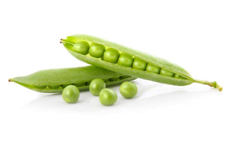 Ripe pea vegetable with green leaf isolated on white backgroundの写真素材