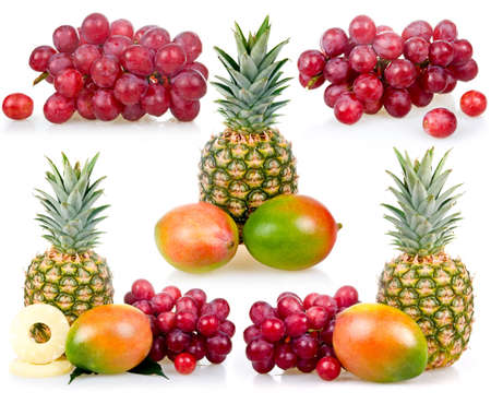 Set of Pineapple, mango and grapes isolated on white background (still life)の写真素材