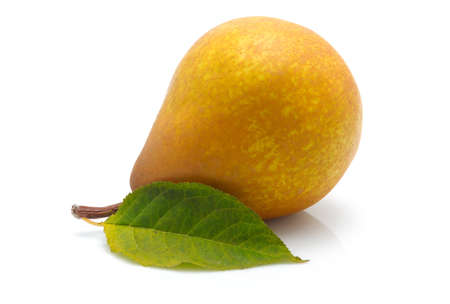 Yellow pear with green leaf isolated on white backgroundの写真素材