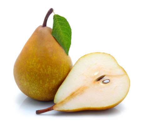 Yellow sliced pears with green leaf isolated on white backgroundの写真素材