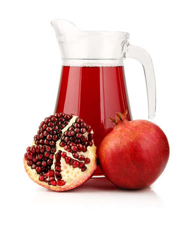 Glass of  pomegranate juice with fruits isolated on white backgroundの写真素材