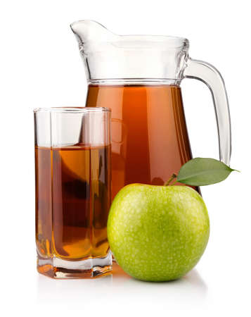 Jug and glass of green apple juice with fruit isolated on white backgroundの写真素材