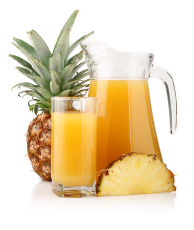 Jug and glass of pineapple juice with fruits isolated on white backgroundの写真素材