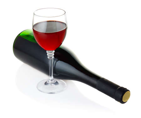 Bottle and goblet of red wine isolated on white backgroundの写真素材