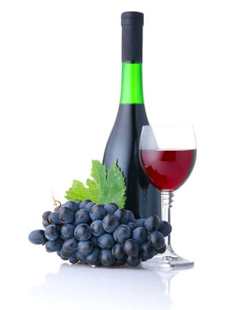 Bottle and goblet of red wine with branch of grapes isolated on white backgroundの写真素材