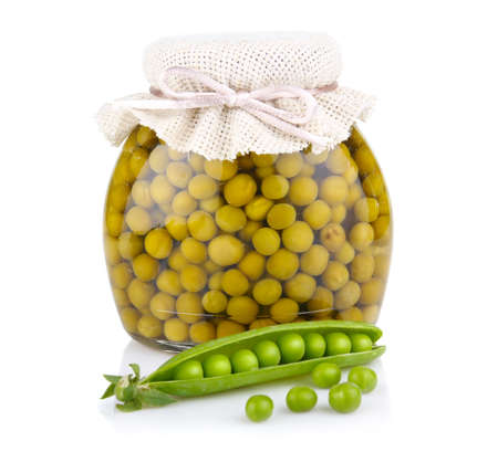 Jar of green pea with fresh pods isolated on white backgroundの写真素材