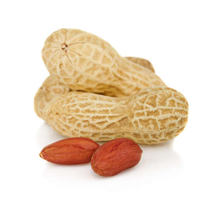 Peanuts pods withs seeds isolated on white backgroundの写真素材