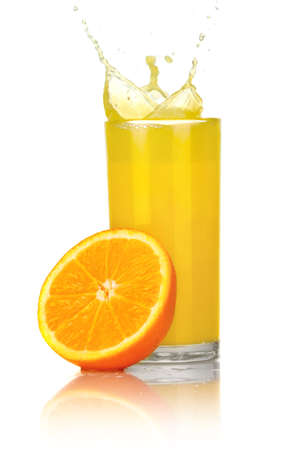 Orange juice with slices of orange in the glass isolated on white の写真素材