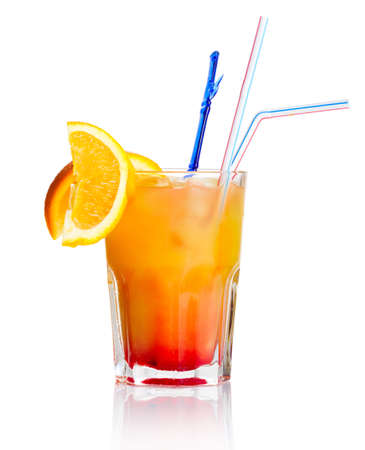 Red alcohol cocktail with orange slice isolated on white backgroundの写真素材