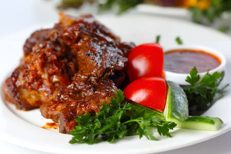 Delicious beef goulash with greens and vegetables (closeup, selective focus)の写真素材