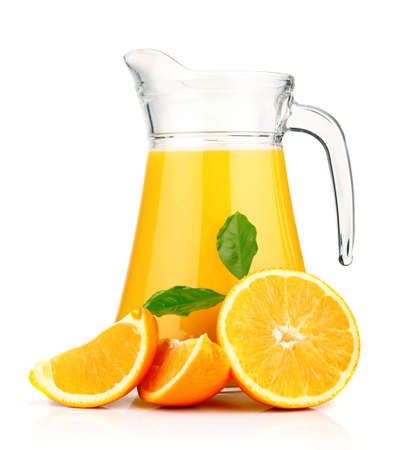 Orange juice in pitcher and oranges  Isolated on white background の写真素材