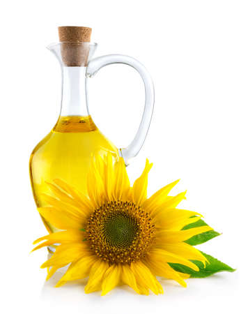 Jug with sunflower oil isolated on white backgroundの写真素材
