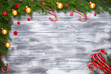 Christmas fir tree on wooden grunge backgroundの写真素材