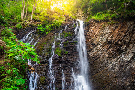 Mountain waterfall Guk in the wood landscape. Ukrainian Carpathians.の写真素材