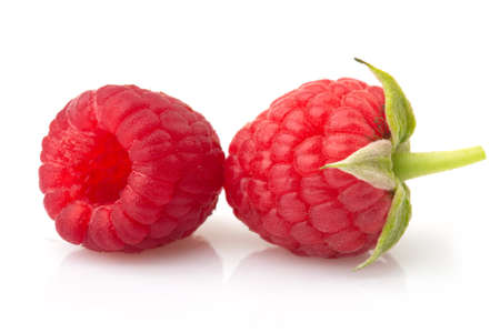 Ripe red raspberries isolated on white backgroundの写真素材