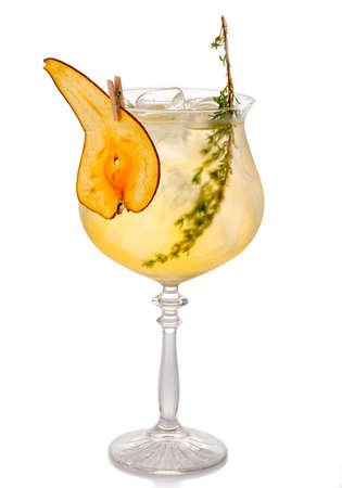 Alcohol coctkail with pear and spices isolated on white backgroundの写真素材