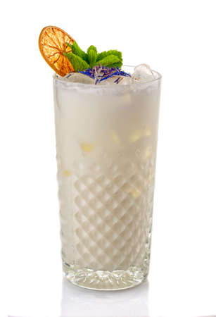 Alcohol coctkail with whipped cream and mint isolated on white backgroundの写真素材