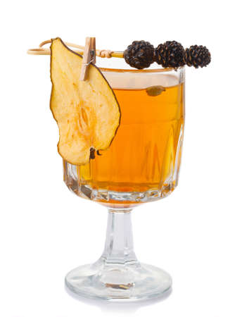 Mulled pear with spices and citrus isolated on white backgroundの写真素材
