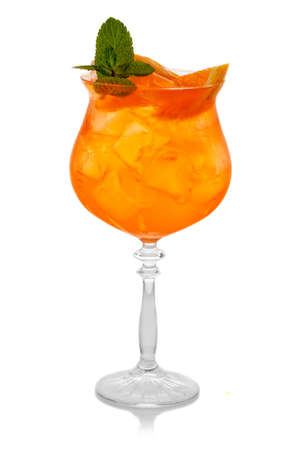 Orange alcohol coctkail with orange and fresh mint solated on white backgroundの写真素材