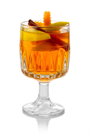 Mulled cider with spices and citrus isolated on whiteの写真素材