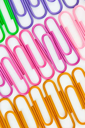 Colorful paper clips isolated on white background,close-up