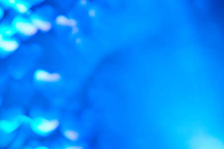 Multicolor space blurred three-dimensional heart-shaped bokeh, neon juicy bright colors, Valentines day, holiday card, abstract backgroundの写真素材