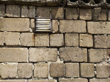 Urban background, white ruined industrial brick wall with copy spaceの写真素材