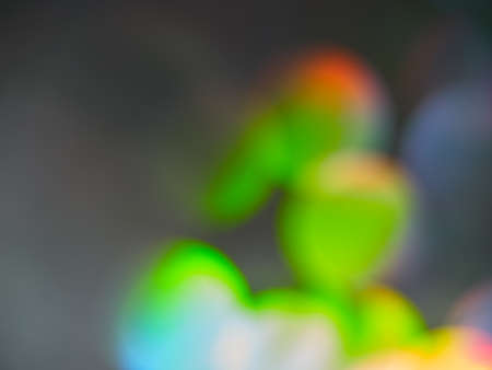 Bright blurry gradient transitions of neon lights, rich color scheme, abstract background, bokeh, space for text.の写真素材