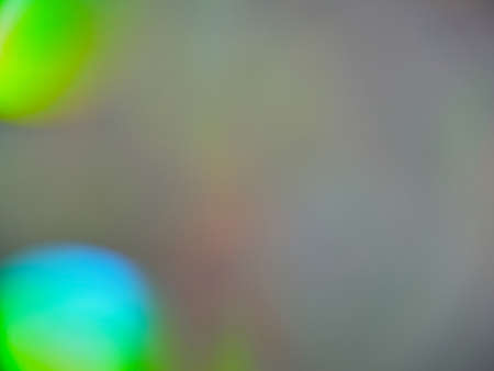 Bright blurry gradient transitions of neon lights, rich color scheme, abstract background, bokeh, space for text.の写真素材
