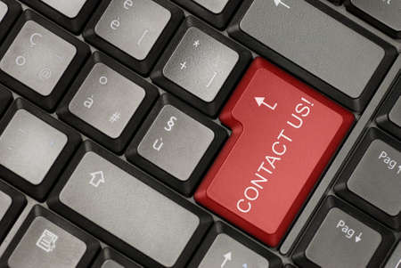 Keyboard of a laptot with contact us buttonの写真素材