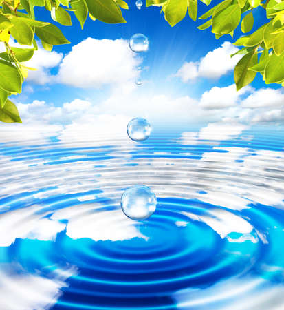 Spa background with water drop and green leafの写真素材