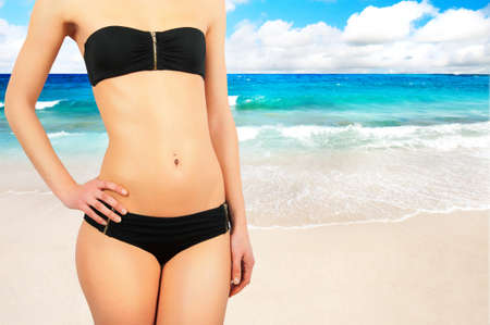 Sexy girl against tropical beachの写真素材