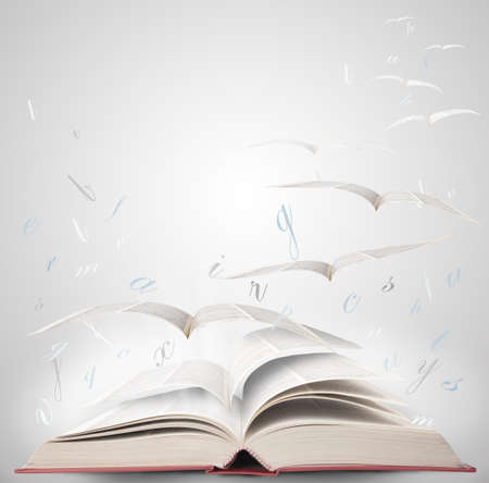 Fly with fantasy reading a bookの写真素材