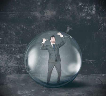 Businessman entrapped in its problemsの写真素材