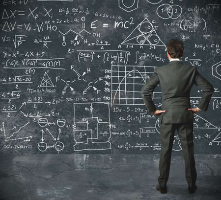 Businessman tries to solve problemsの写真素材