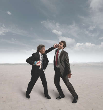 Two businessmen in boxing challengeの写真素材