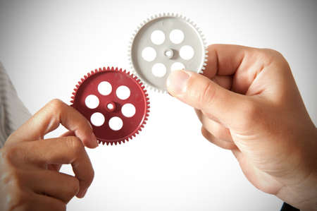 partnershiop concept with gear and businessmsnの写真素材