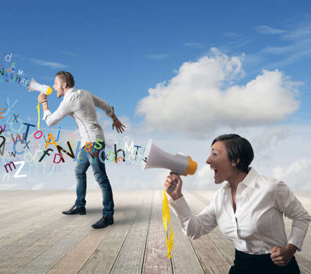 Business team with megaphone outdoorの写真素材