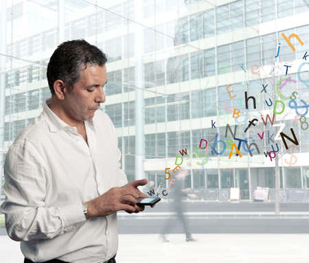 Businessman writing with touch screen phoneの写真素材