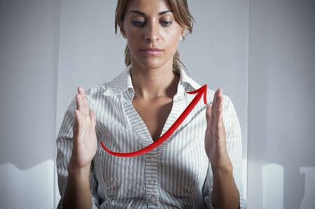 A businesswoman show positive statistics trendの写真素材