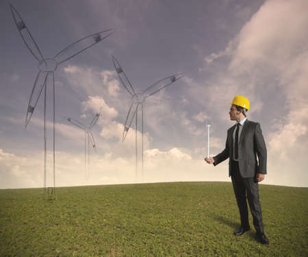 Concept of businessman that plans a wind turbine projectの写真素材